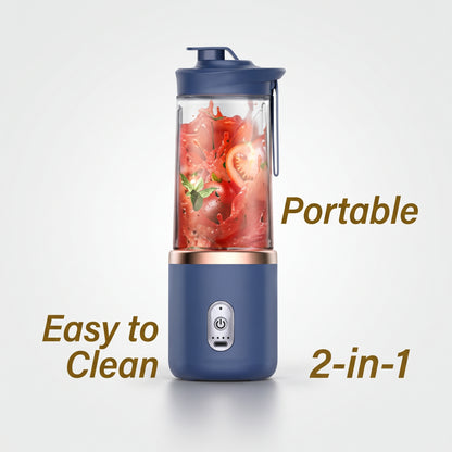 A portable electric blender with a navy blue base, clear jar, and navy lid, shown with food inside on a light gray background with text overlays reading 'Portable', 'Easy to Clean', and '2-in-1'.